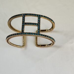Heidi Daus Gold-Tone Cuff Bracelet with Blue Swarovski Crystals